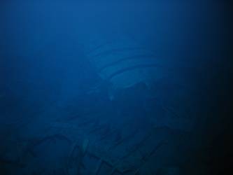 Large piece of twisted steel plate on seabed